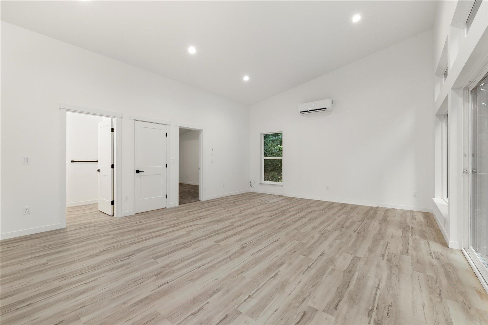 Empty living room with hardwood floors